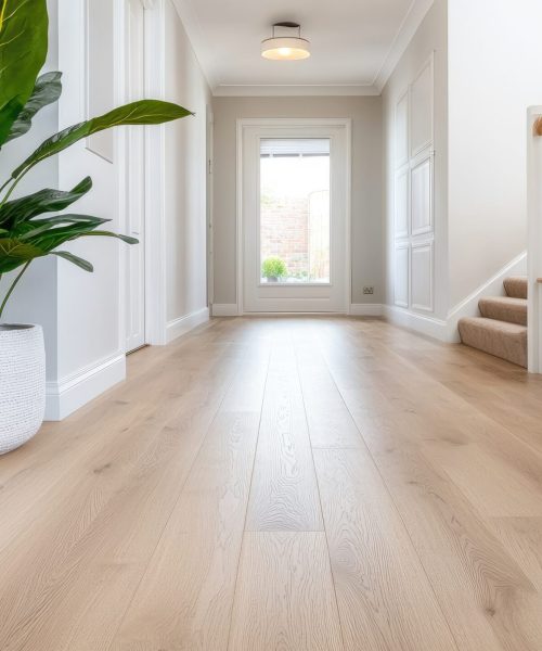 Modern hallway with oak flooring and plants