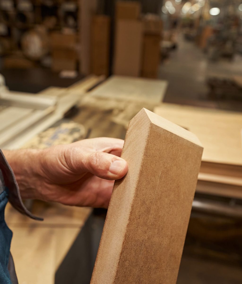 close-up-of-carpenter-checking-wooden-bar-2024-10-18-08-37-08-utc (1)